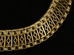 thumbnail of Detail of c1880 French 18K yellow gold bracelet with filigreed links, shown on black background