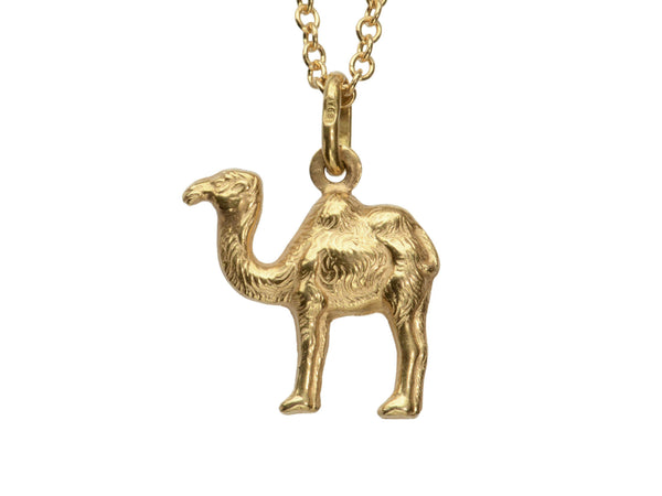 A c1960 18K yellow gold Camel Charm on a cable chain. A stamp on the bale reads "39A." On white background.