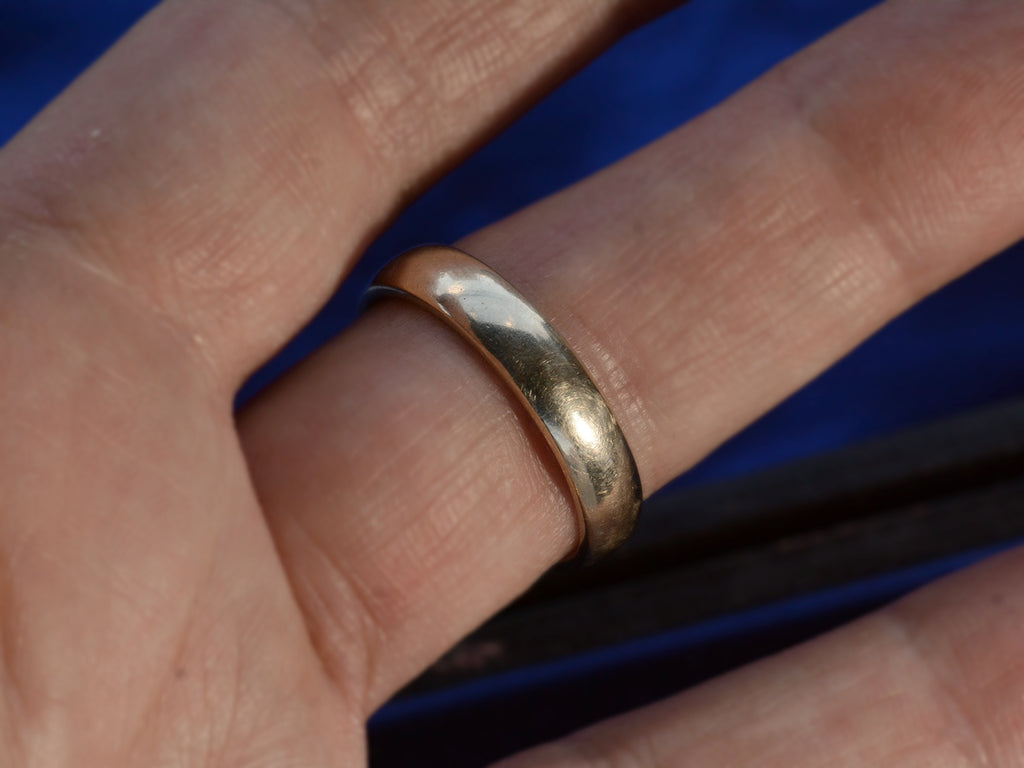 c1980 Men's 18K White Gold Wedding Band, on finger for scale