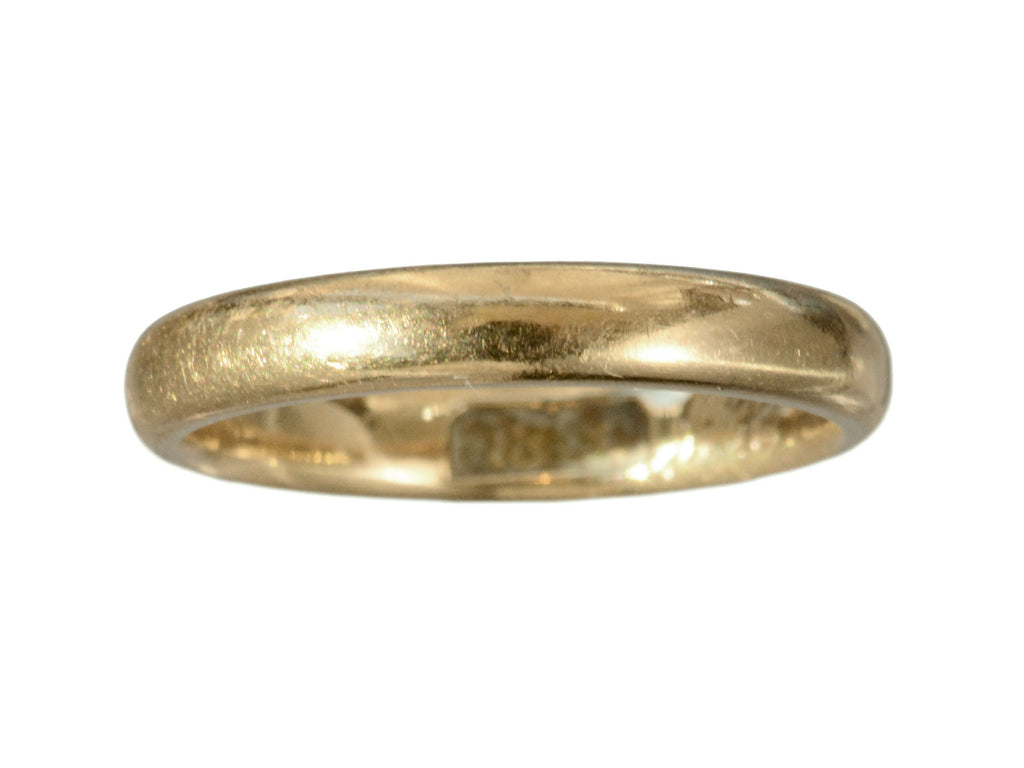 A rounded c1914 antique 18K yellow gold wedding band, shown on white background.