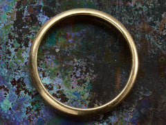 thumbnail of 1923 Antique Rounded 3.3mm Men's Wedding Band in 14K Rosy-Yellow Gold (on colorful background)