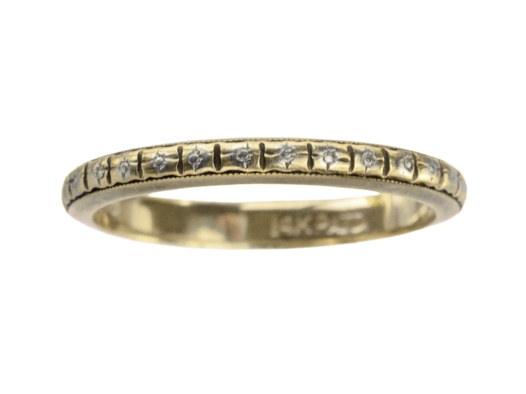 c1920 thin yellow gold Art Deco wedding band with patterning and white gold accents, shown on white background. A stamp inside reads "14K PATD"