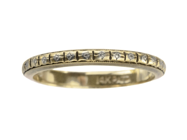 c1920 thin yellow gold Art Deco wedding band with patterning and white gold accents, shown on white background. A stamp inside reads "14K PATD"