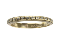 thumbnail of c1920 thin yellow gold Art Deco wedding band with patterning and white gold accents, shown on white background. A stamp inside reads "14K PATD"