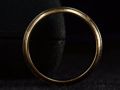 thumbnail of Side profile view of vintage men's wedding band in yellow gold with center stripes of white gold, shown on dark background