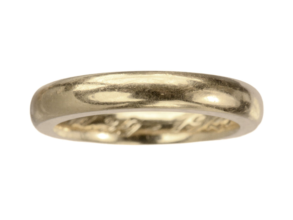 A heavy antique wedding band in a rosy-yellow gold measuring 3.2mm wide. Shown on white background.