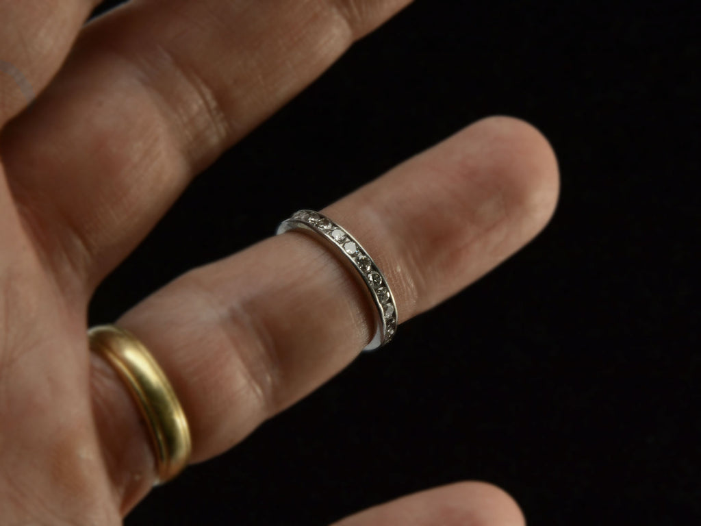 c1950 Diamond Eternity Band in Platinum Channel Setting (on finger for scale)