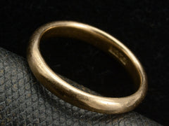 thumbnail of Angled view of an antique rounded rosy-yellow 14k gold wedding band, shown on white background. A "14K" mark is visible inside.