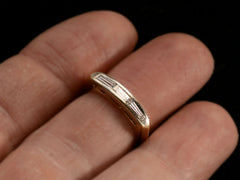 thumbnail of Two toned vintage ring with three diamond baguettes. Shown on finger.