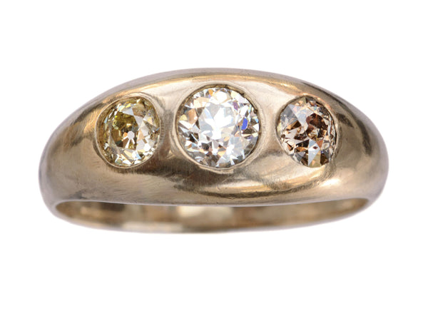 c1890 Victorian Gypsy Ring with a white diamond center and a light yellow and brown diamond on either side in rosy 10k mounting.
