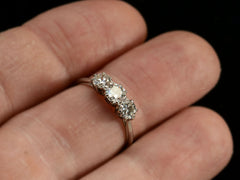 thumbnail of Simple c1920 Three Diamond Ring in Platinum (on finger)