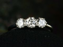 thumbnail of Front profile of simple c1920 Three Diamond Ring in Platinum (on dark background)