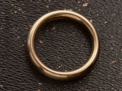 thumbnail of Side profile of a rounded 4.0mm wide antique rosy-yellow gold wedding band, shown on dark background.