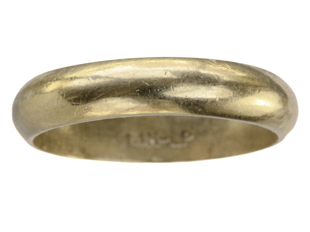 Vintage men's 14K yellow gold wedding band with rounded surface and patina, shown on white background. A faint mark inside the ring is visible: "14K - LP"