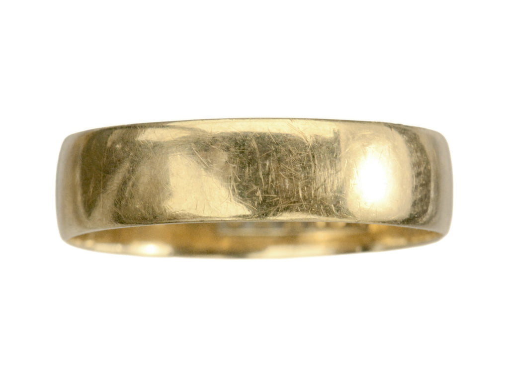 Wide flat 18K yellow gold antique wedding band, on white background.