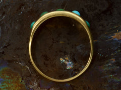 thumbnail of Side profile of c1900 18K Gold Ring with Five Oval Turquoise Cabochons, shown on dark background