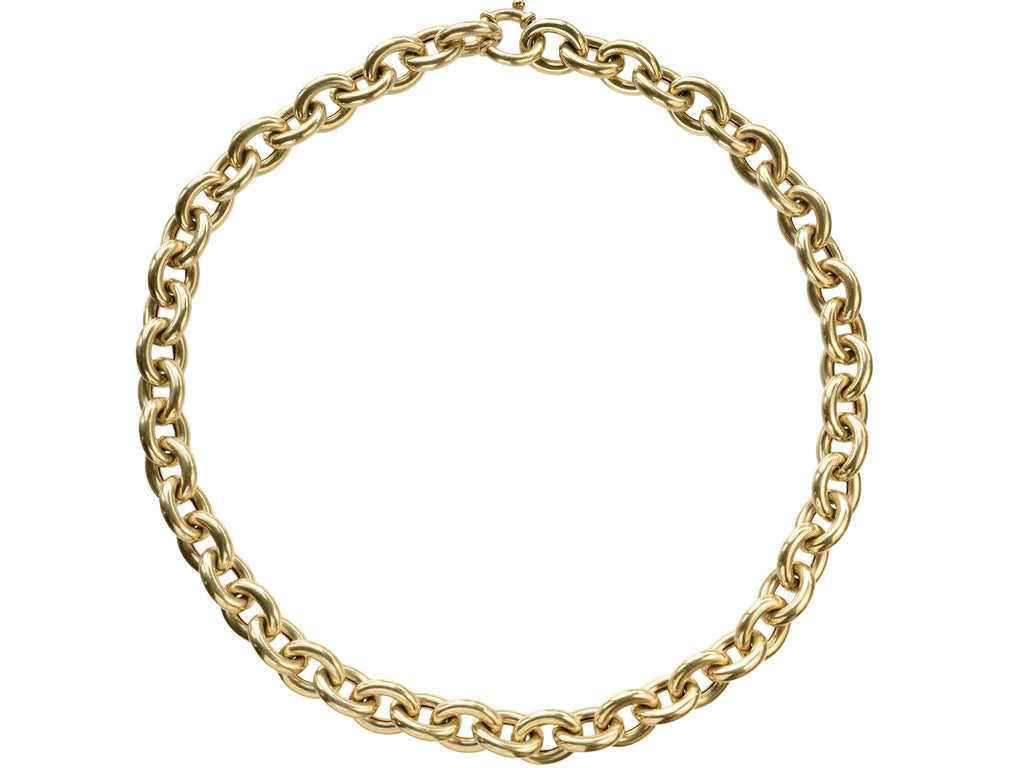 A c1960 14K yellow gold oval chain link necklace, shown on white background.