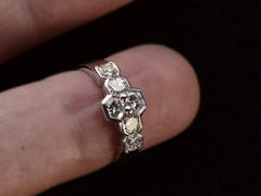 thumbnail of Vintage c1960 white gold ring with a cluster of six diamonds. Shown on finger.