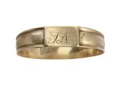 thumbnail of A petite antique gold signet ring with the letters "I.N" engraved on a rectangular face. Shown on white background.