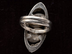 thumbnail of Inside view of silver c1910 Arts & Crafts movement ring on black background.
