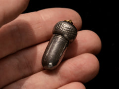 thumbnail of c1900 Silver Acorn Pendant (on hand for scale)