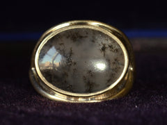 thumbnail of Front view of oval dendritic agate ring in yellow gold. Shown on dark background.