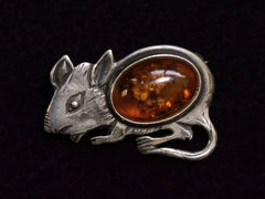 thumbnail of Front side of Vintage Sterling Silver and Amber Mouse Brooch (on dark background)