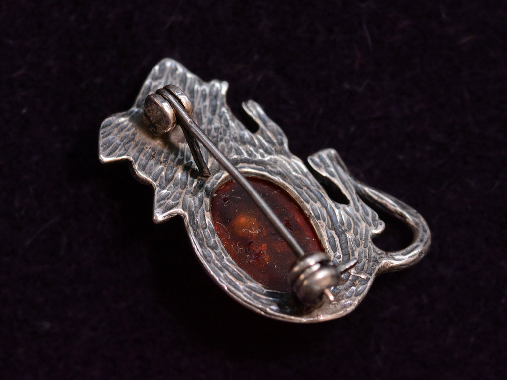 Reverse side of Vintage Sterling Silver and Amber Mouse Brooch (on dark background)