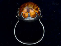 thumbnail of Profile view c1970 Amber and Silver Ring (on black background)