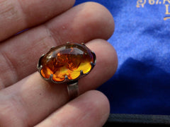 thumbnail of c1970 Amber and Silver Ring (on hand for scale)