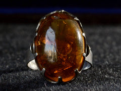 thumbnail of Front view c1970 Amber and Silver Ring (on black background)