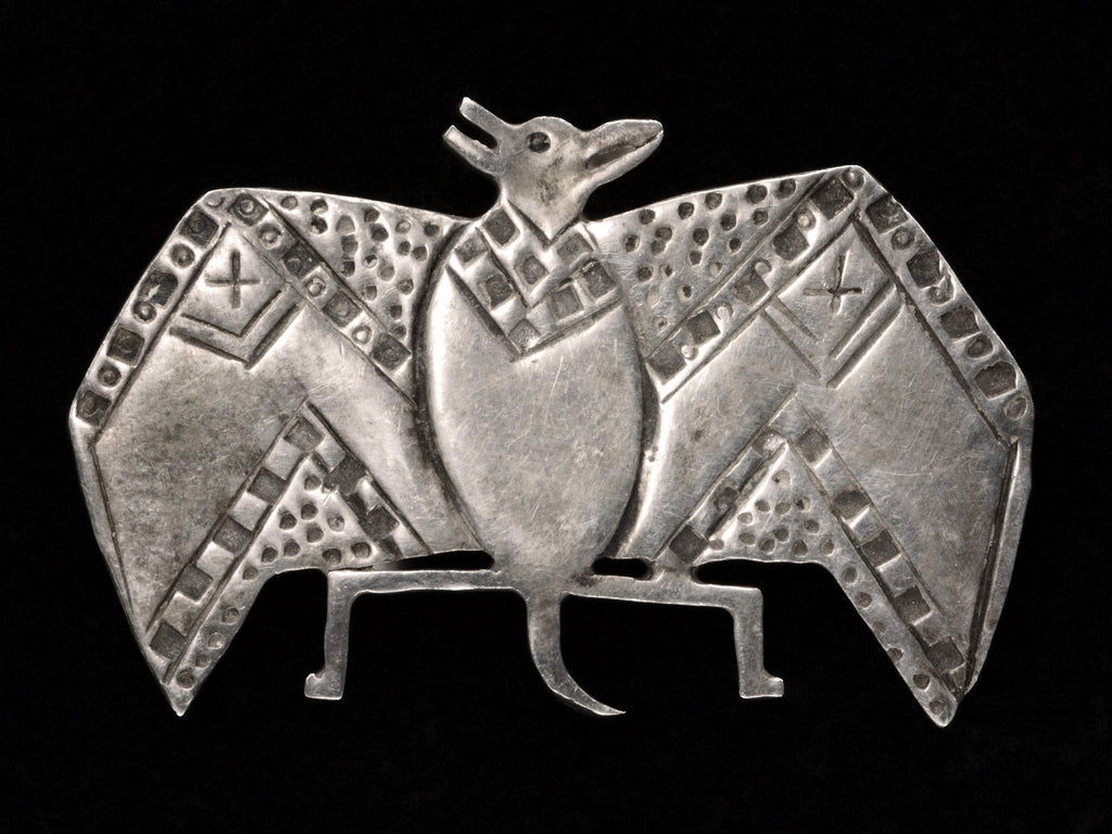 c1980 Silver Bat Brooch on black background