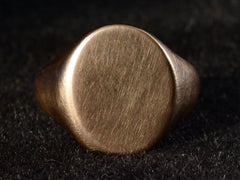 thumbnail of Front detail view of c1910 Gold Signet Ring (on dark background)