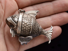 thumbnail of c1960 Massive Fish Pendant (on hand for scale)