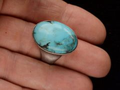 thumbnail of Large oval turquoise and silver ring on finger