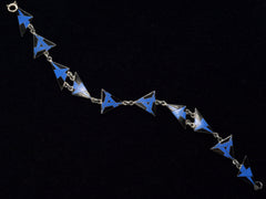 thumbnail of Art Deco silver bracelet with blue and black geometric triangle links on a black background