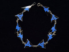 thumbnail of Detail of Art Deco silver bracelet with blue and black geometric triangle links on a black background