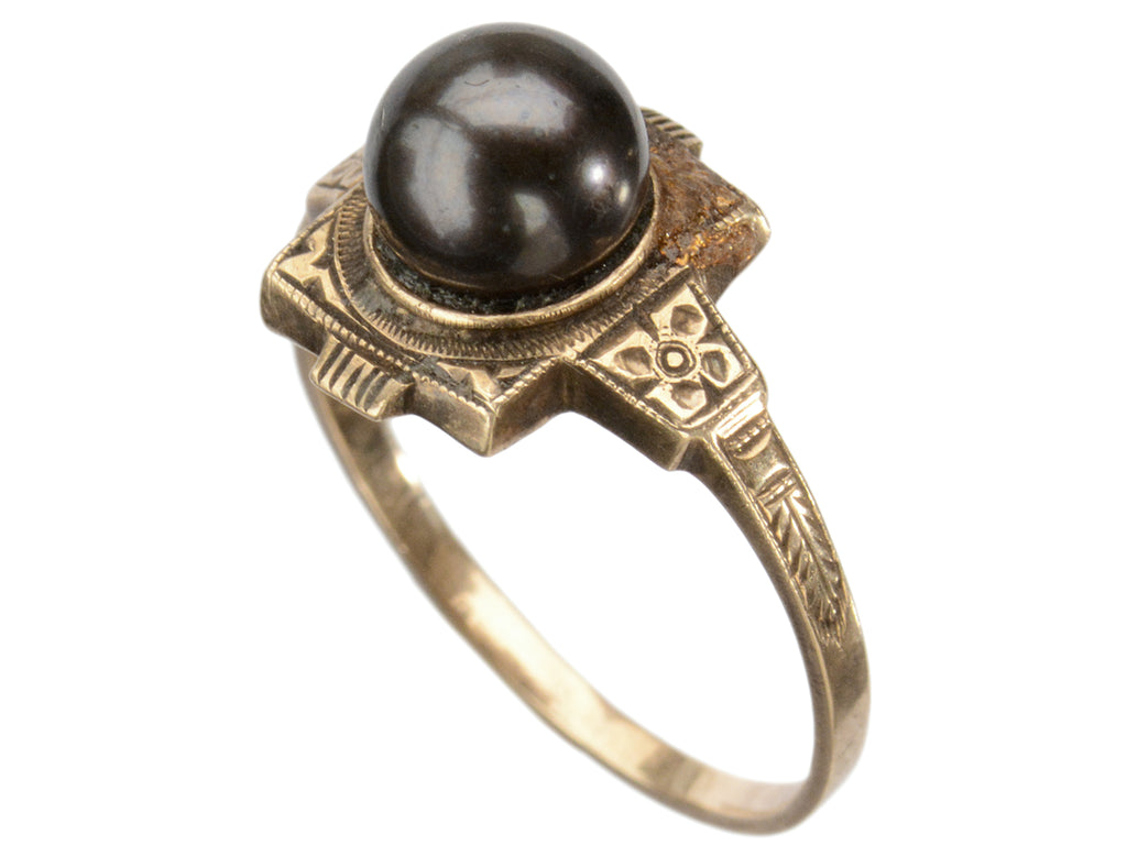 c1920 Art Deco black pearl ring in yellow gold (shown on white background)