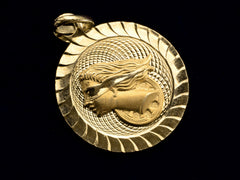 thumbnail of c1980 Justice Gold Pendant (on black background)