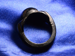 thumbnail of Side profile view of c1880 Black Bog Oak Ring (on blue background)