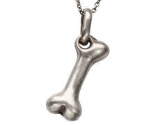 thumbnail of Vintage silver bone-shaped pendant on a white background