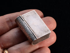 thumbnail of c1920 Book Pill Box (on hand for scale)
