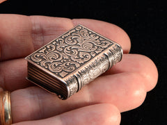 thumbnail of c1900 Ornate Book Box (on hand for scale, showing backside)