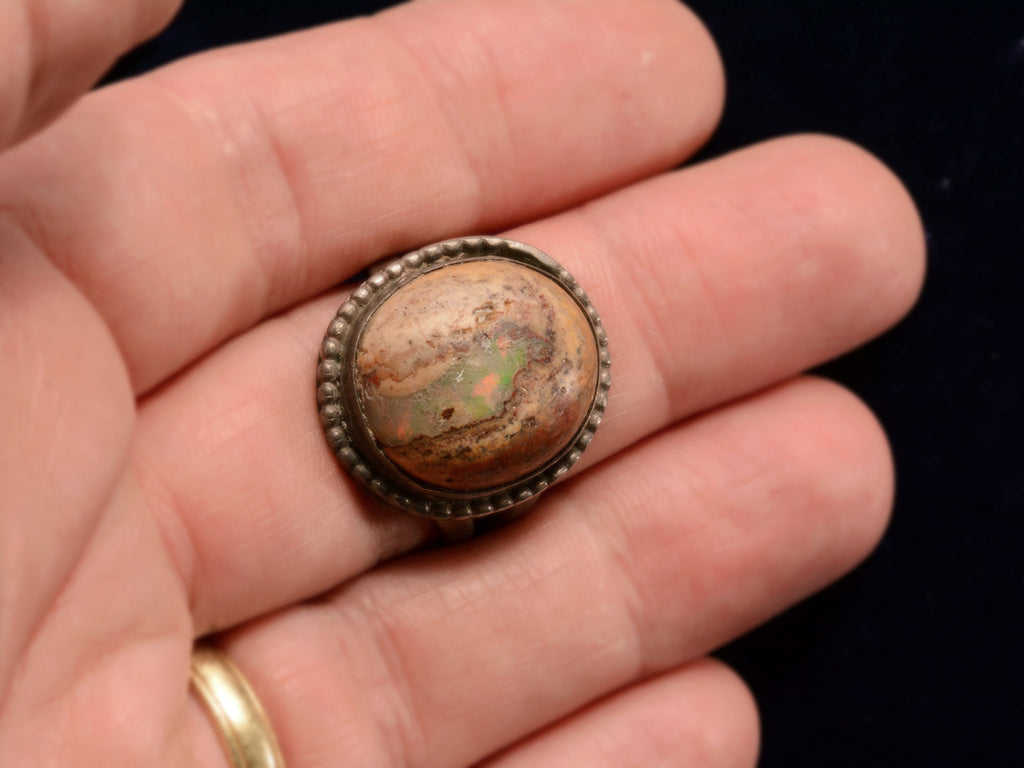 Vintage Boulder Opal Ring in Silver, shown on hand for scale