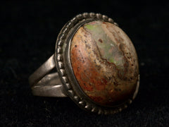 thumbnail of Vintage Boulder Opal Ring in Silver, left angle on black background