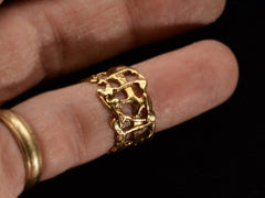 thumbnail of Wide brutalist wedding band in 18k yellow gold, shown on finger for scale.