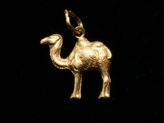 thumbnail of c1980 18K Camel Charm (reverse side shown on black background)