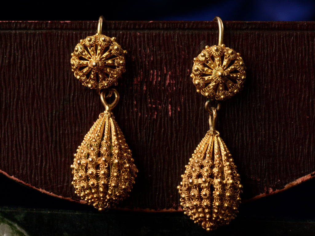 c1870 Yellow Gold Cannetille Drop Earrings (detail view on dark red background)