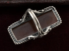 thumbnail of Inside view of vintage silver ring with intricate detailing and a long rectangular carnelian stone, shown on dark background.