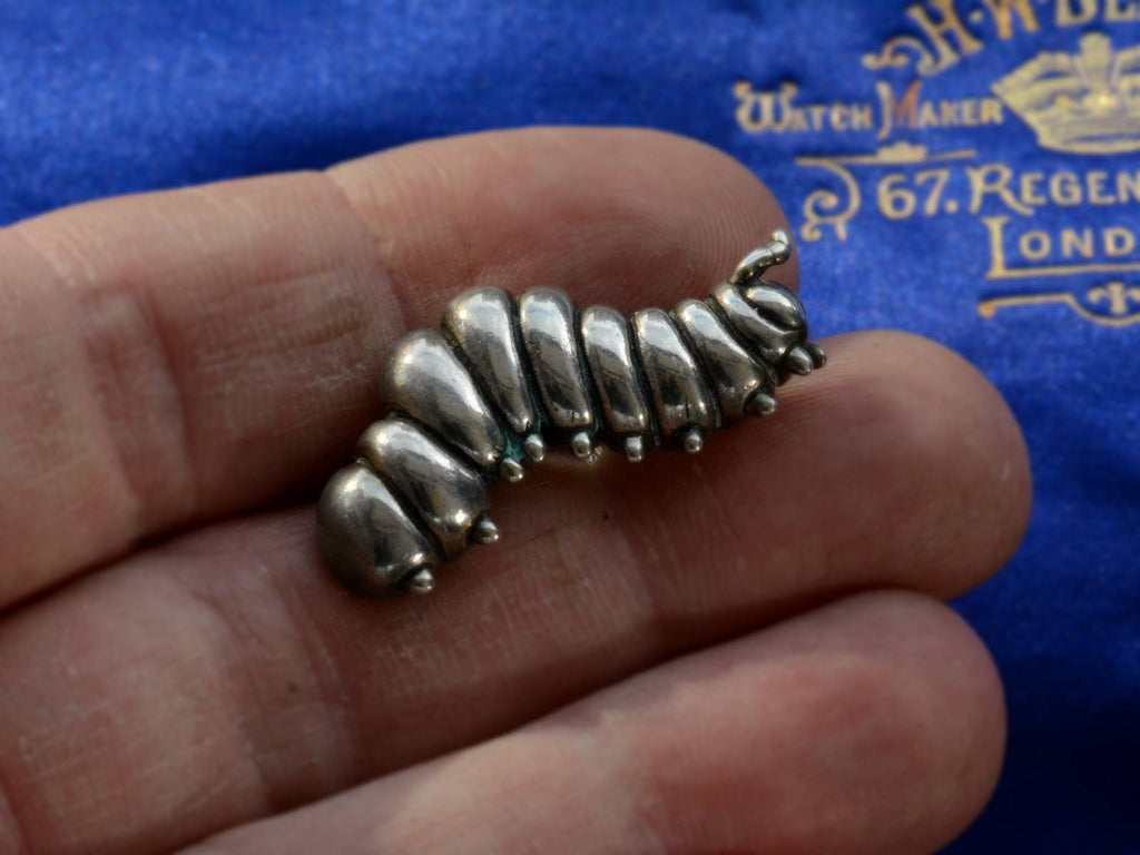 c1980 Silver Caterpillar Brooch (on hand for scale)